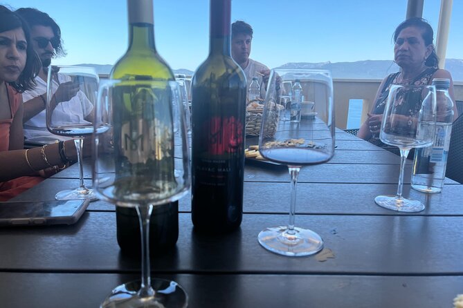 2 Hours Wine Tasting in Dubrovnik Old Town - Tapas pairing with the white wines: calamari plus bread and houmous