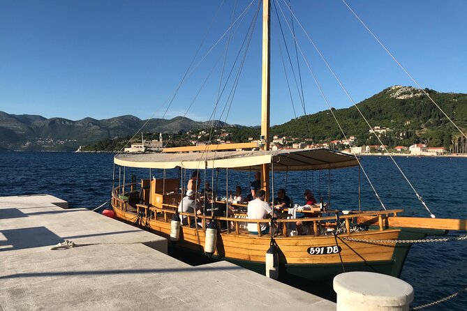 Dubrovnik Islands Private Rented Boat Cruise - What the boat provides: wine, shade, and practical comfort