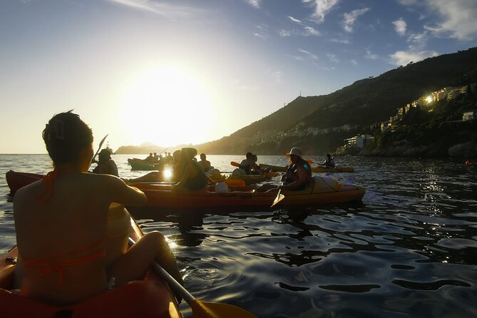 Dubrovnik: Sunset Kayak & Snorkel Tour with Wine & Water - Group size, guide style, and why English matters