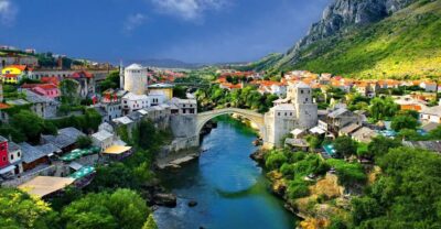 From Dubrovnik: 1-Way Tour to Sarajevo via Mostar and Konjic - Kravica Falls swim and emerald water: the first wow stop