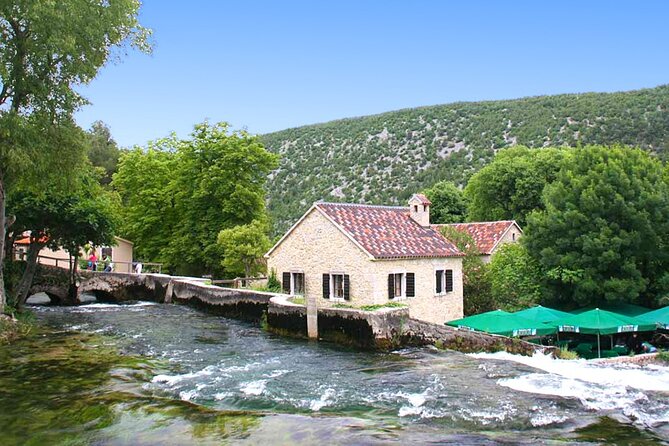 Krka National Park - Private Excursion from Dubrovnik with Mercedes Vehicle - Krka National Park: boat crossing, waterfall walks, and that monastery stop
