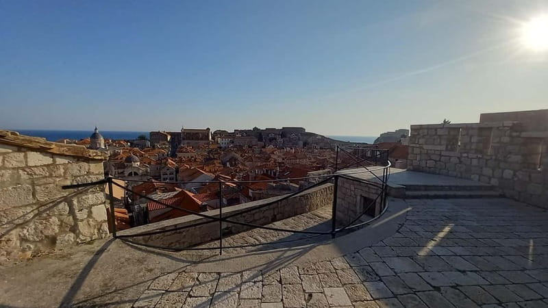 Sunset Wall Walk: 75-Minute Guided Tour & Free Exploration - The southern walls at your pace: views, drinks, and full-circle time